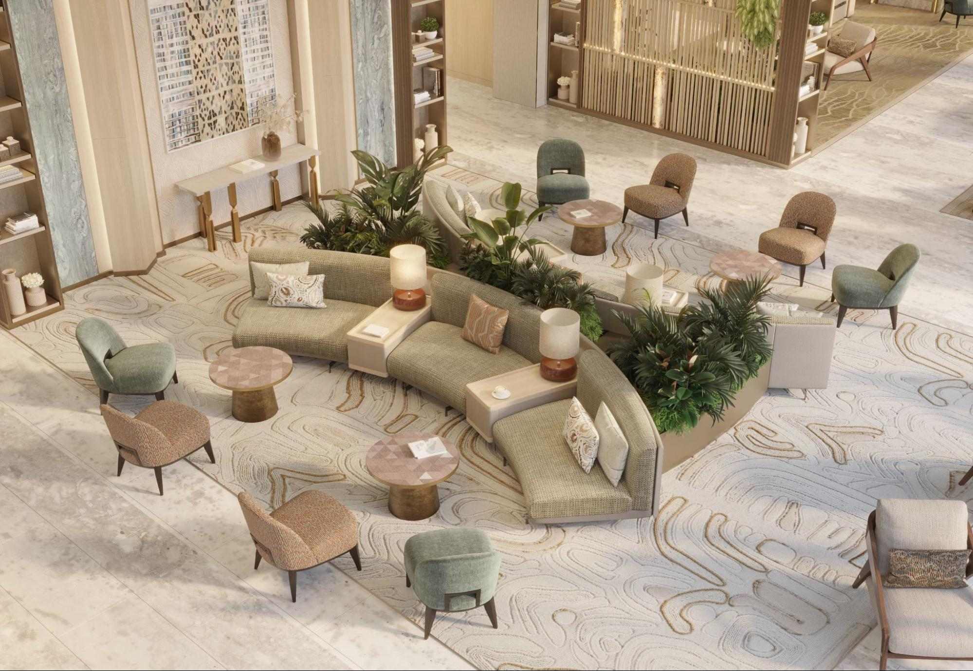 Aerial view of an elegant Shang Bauhinia Residences lounge with curved seating, indoor greenery, and refined luxury interiors