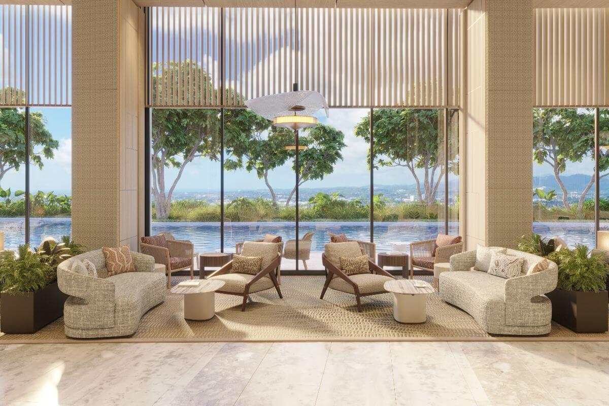 Poolside lounge at Shang Bauhinia Residences with floor-to-ceiling windows, elegant seating, greenery, and city views