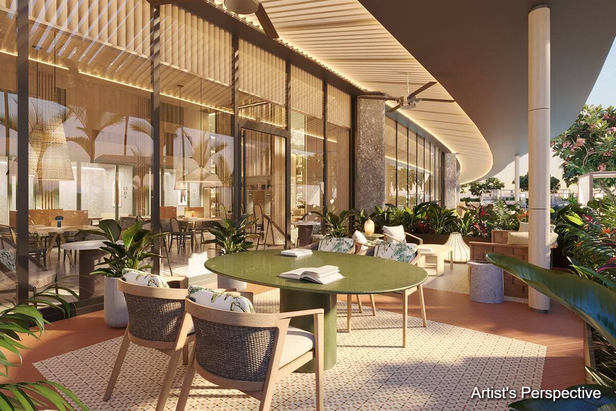 Landscaped outdoor lounge at Shang Bauhinia Residences with contemporary seating, lush greenery, and open-air spaces