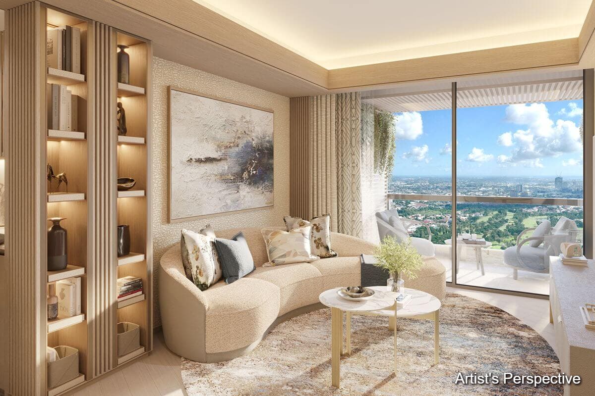 Bright Shang Bauhinia Residences living room with built-in storage, curved seating, and a balcony overlooking the Cebu cityscape