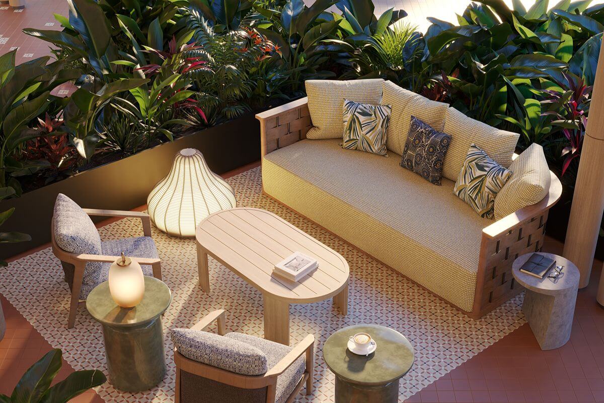 Landscaped outdoor lounge with comfortable seating and lush greenery, providing a relaxing shared space for families