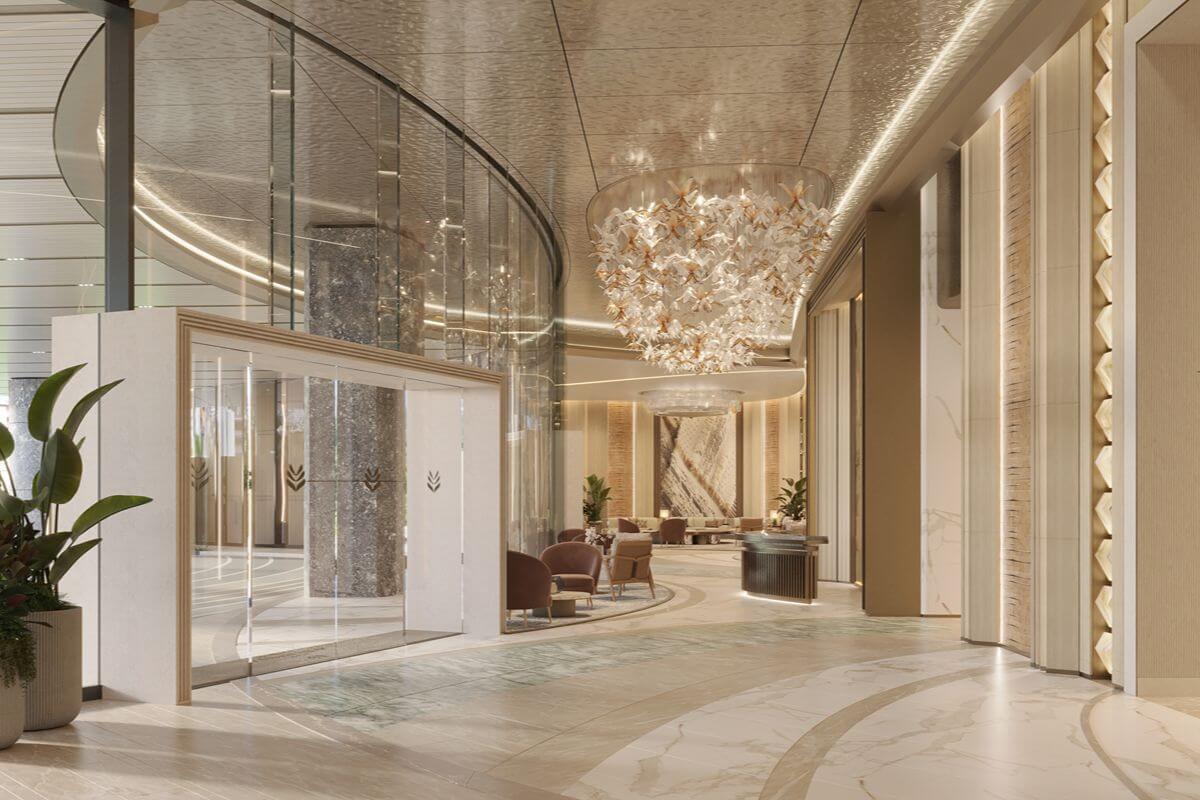 Elegant lobby at Shang Bauhinia Residences with high ceilings, glass walls, refined lighting, and spacious contemporary interiors